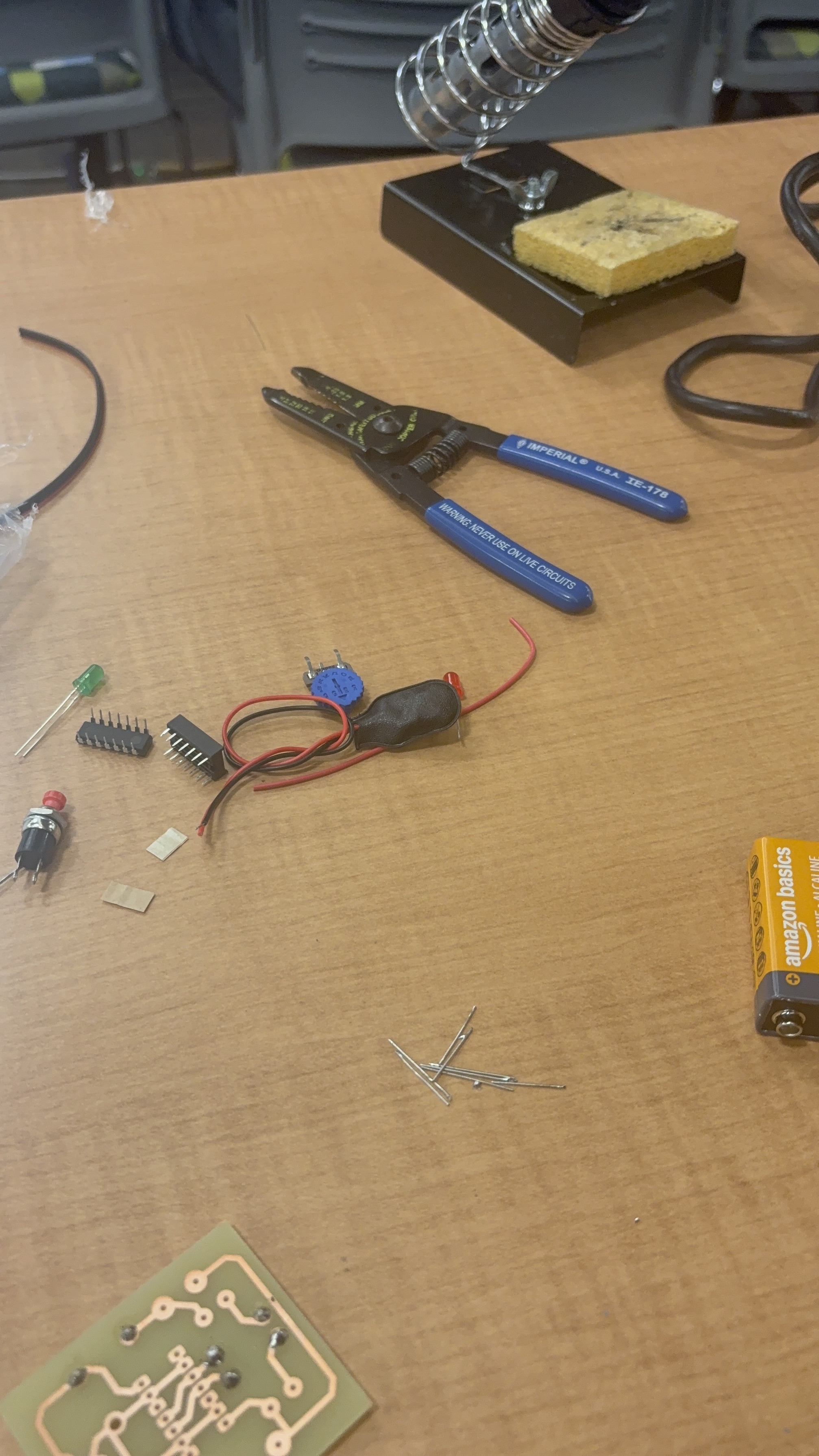 Soldering project materials at the Energy Expo