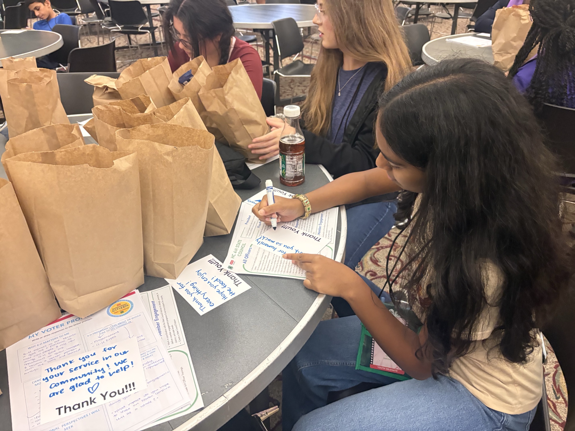 Packing Habitat for Humanity thank-you bags.